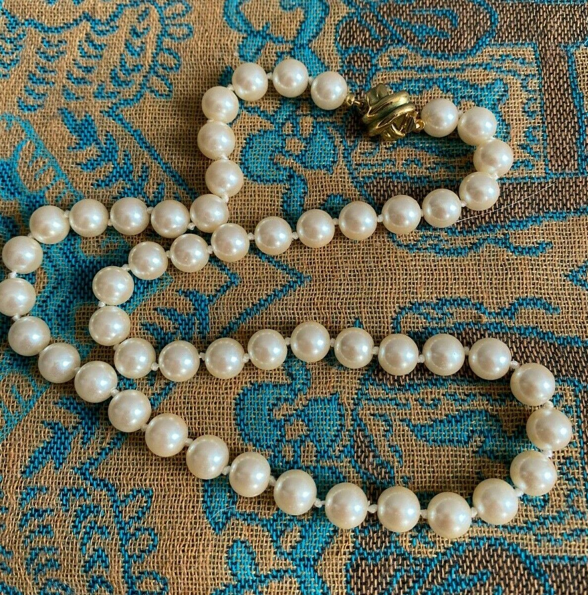 Knotted Pearl Strand Necklace